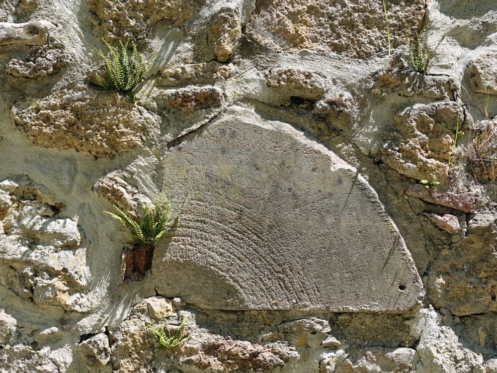 eingemauerter Mühlstein