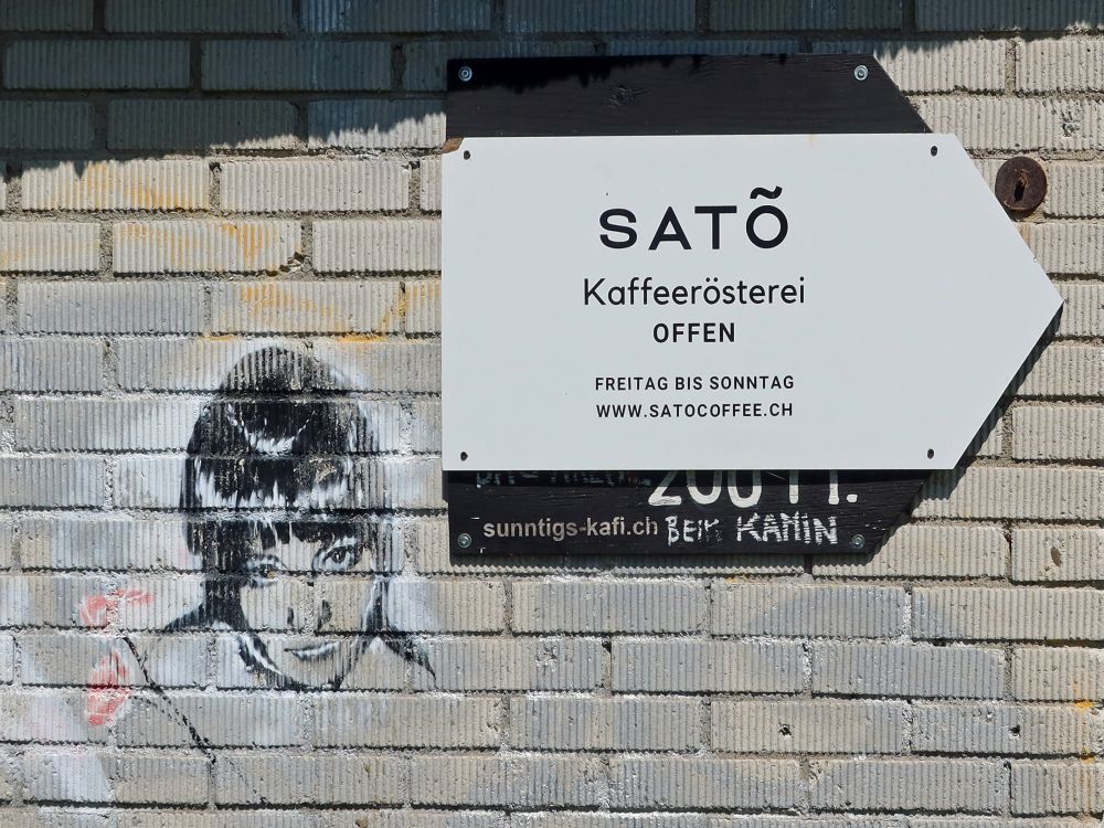 Grafitti und Wegweiser